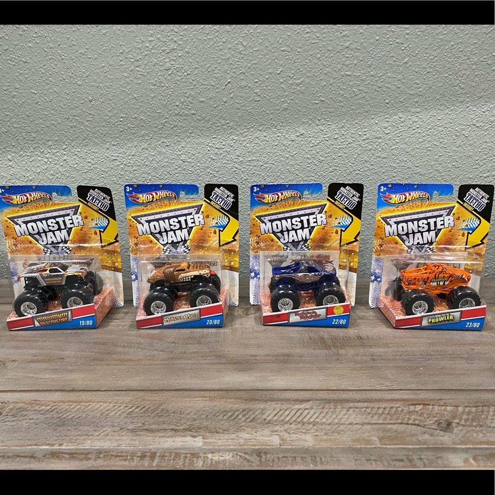 RARE 2010 HOT WHEELS MONSTER JAM TATTOO SET OF 4 BRAND NEW AND SEALED!!!